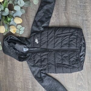 Nike Therma-FIT puffer jacket with a black body and heather gray sleeves 6